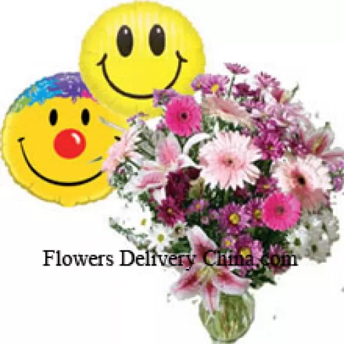 Assorted Flowers In A Vase Along With Smiley Balloons