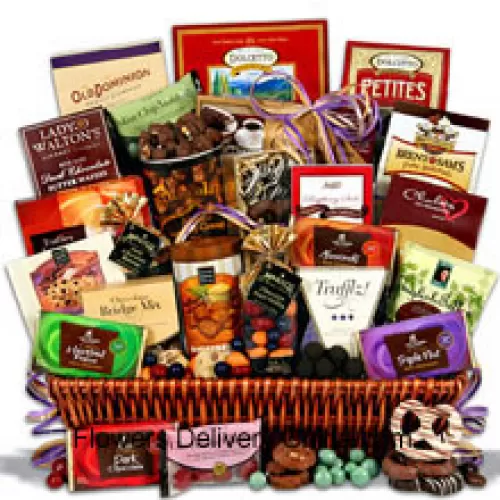 This amazing new addition to our chocolate gift baskets collection is overflowing with twenty-four sinfully delicious chocolate indulgences that will impress the taste buds of even the most seasoned chocoholics. With a generous selection of gourmet treats ranging from chocolate bars to chocolate cookies and everything in between, it is easy to see why this design is a show-stopper. (Please Note That We Reserve The Right To Substitute Any Product With A Suitable Product Of Equal Value In Case Of Non-Availability Of A Certain Product)